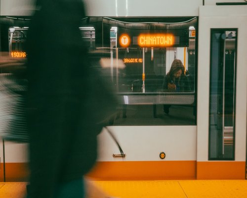 Commute in urban public transport with blurred background indicating movement