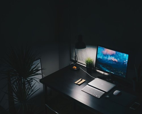 Quiet desk setup illustrating editorial and research space